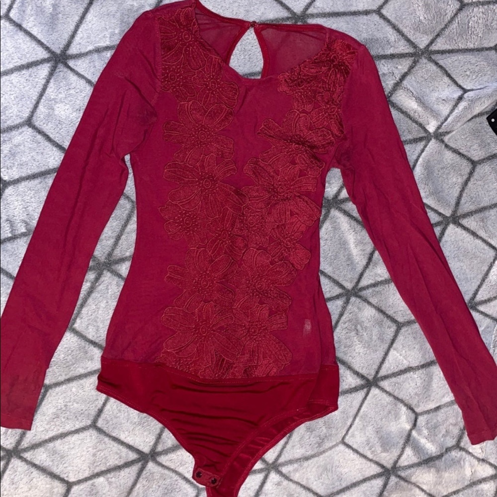 Fashion Nova Long sleeve burgundy floral bodysuit.